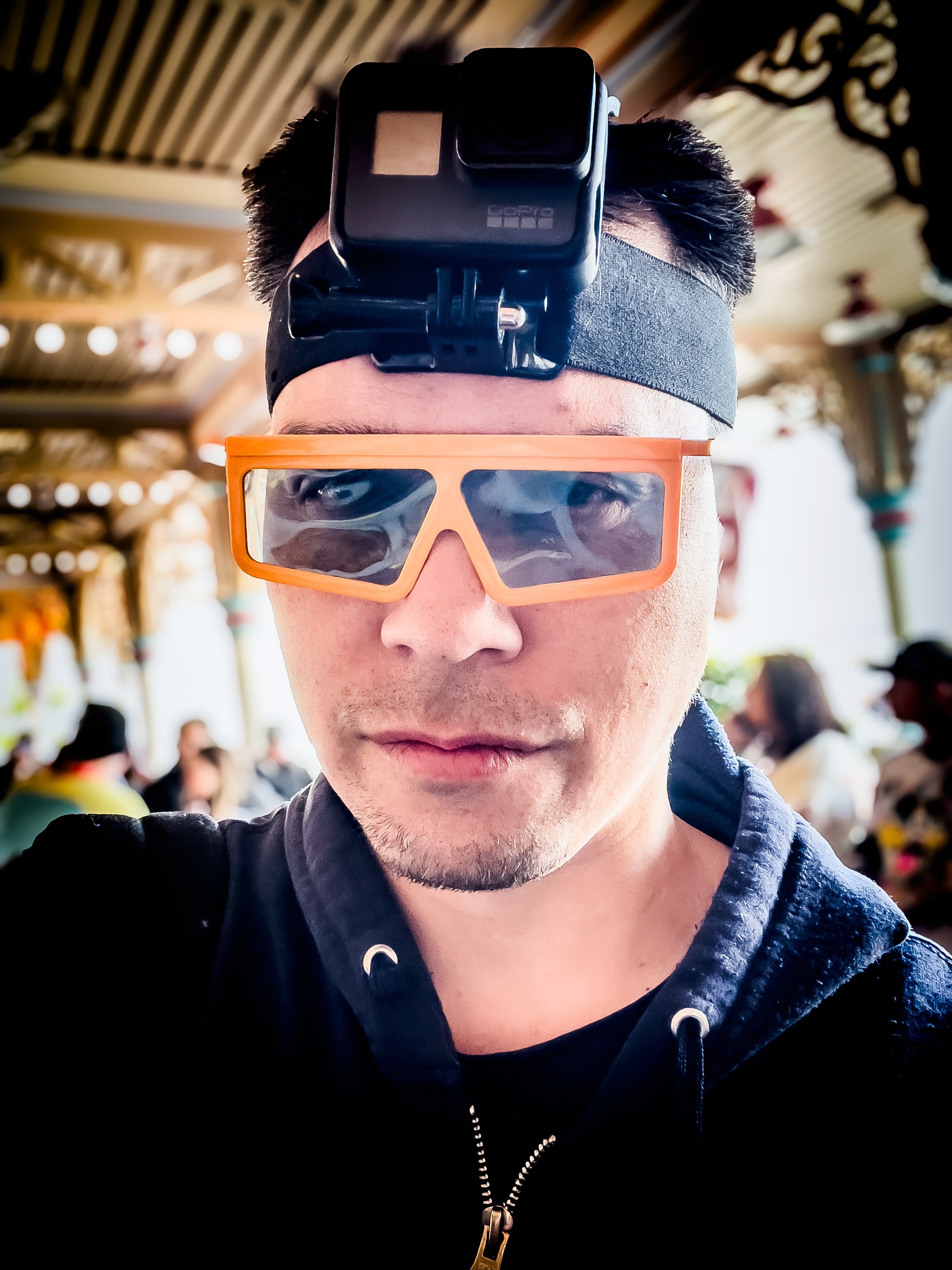 Jason wearing 3D glasses with a GoPro camera strapped to his head.