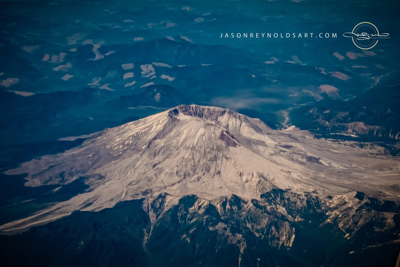 Aerial view of Mount Saint Helens and surrounding ash plain