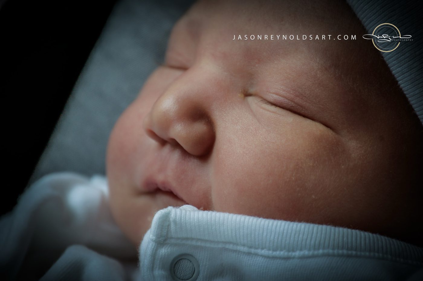 Close-up of Sleeping Newborn Face