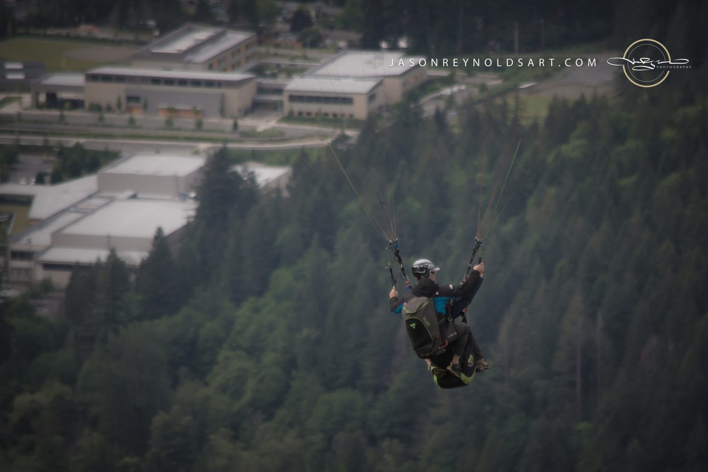 Issaquah Tandem Paragliders Above Forest Ridge