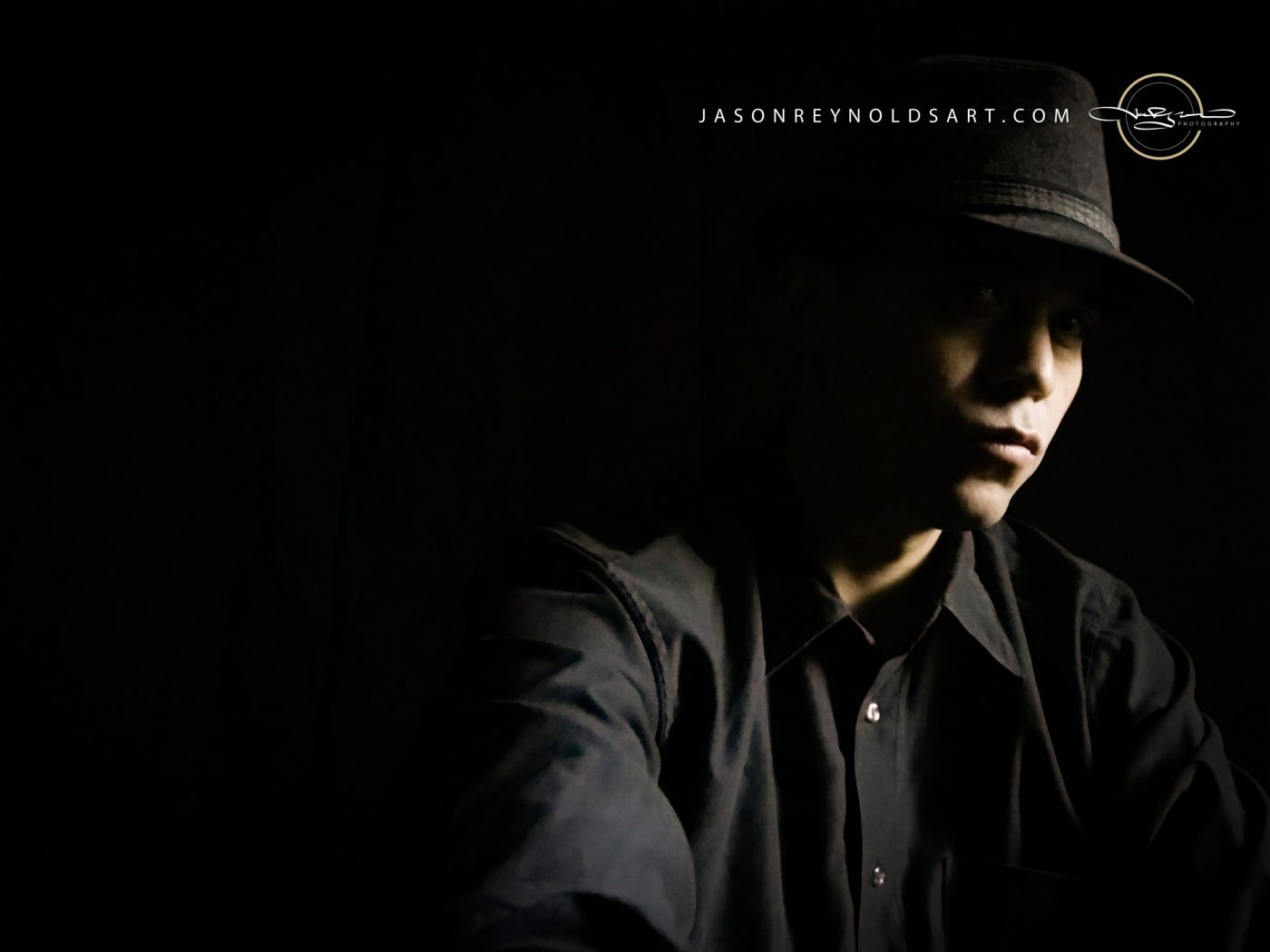 Low‑Key Portrait with Fedora