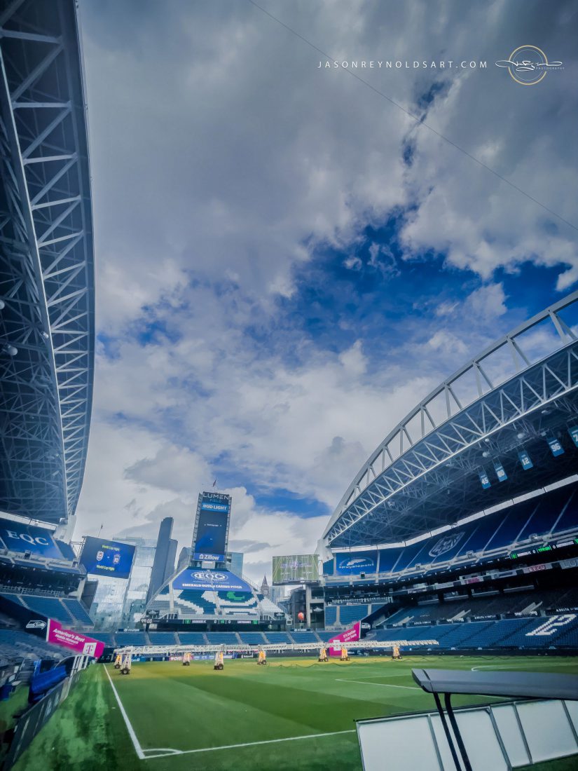 Lumen Field — Stadium Interior with City Skyline and Dramatic Sky