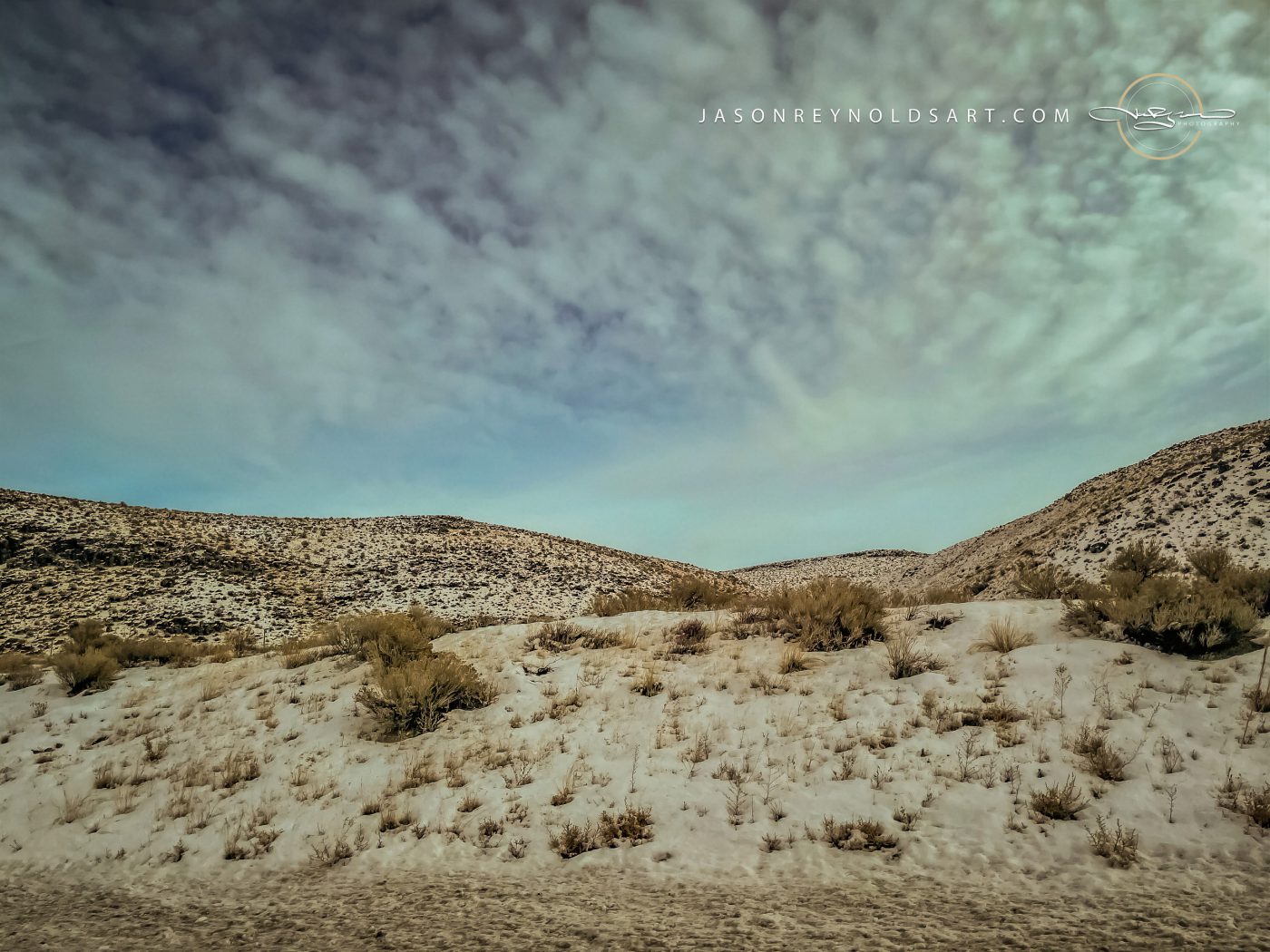 Quincy Foothills — Snow-Dusted Sagebrush under Textured Sky