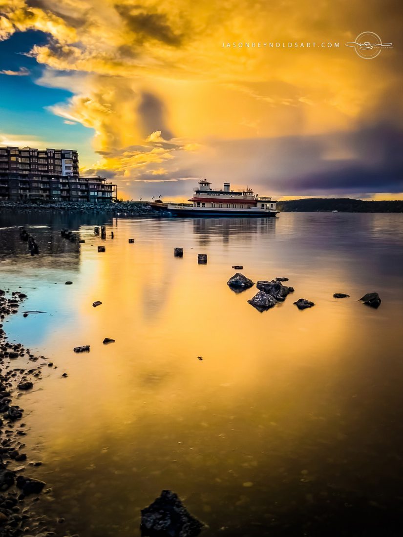 Ruston waterfront under golden clouds