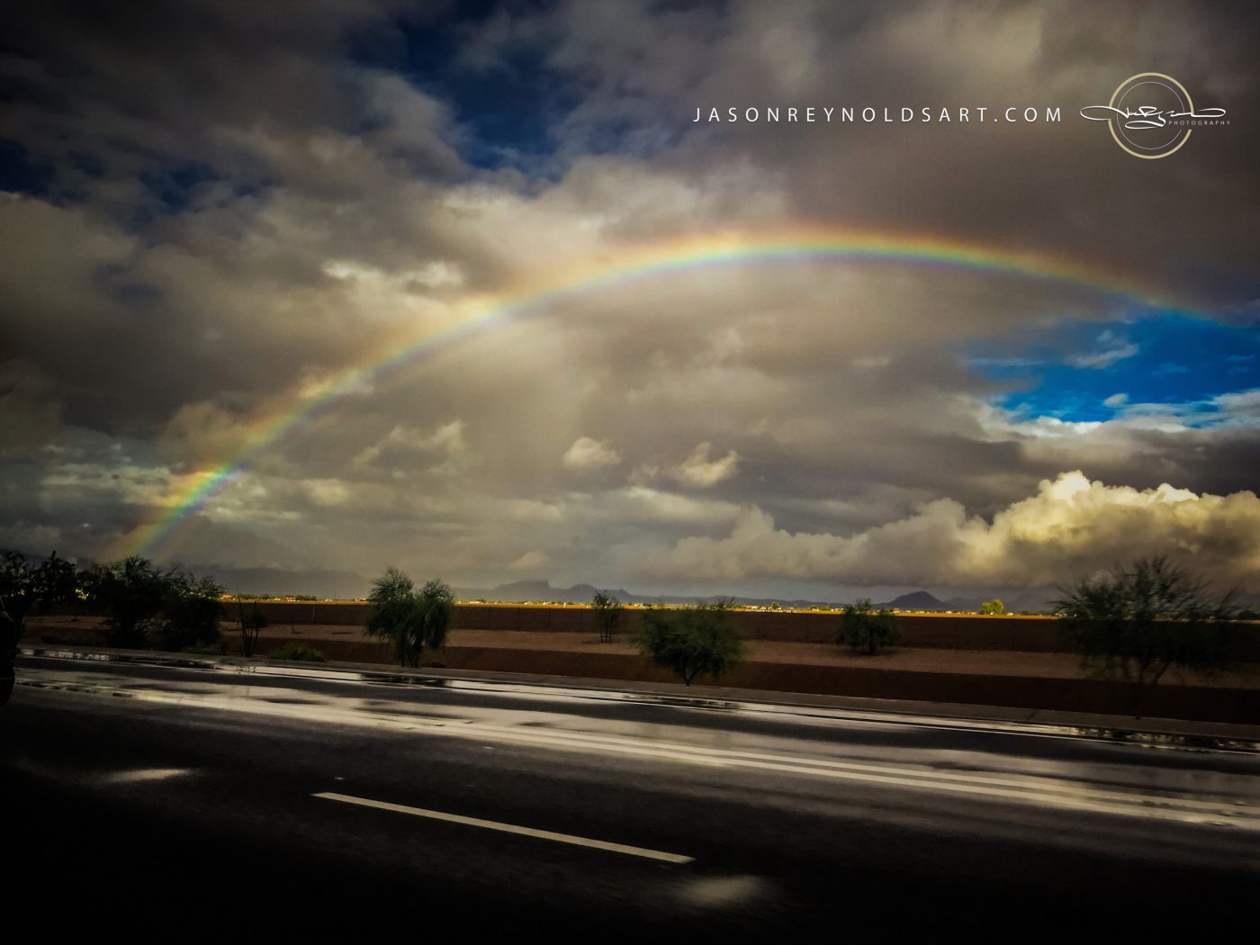 Scottsdale Rainbow Over Wet Highway and Distant Mountains