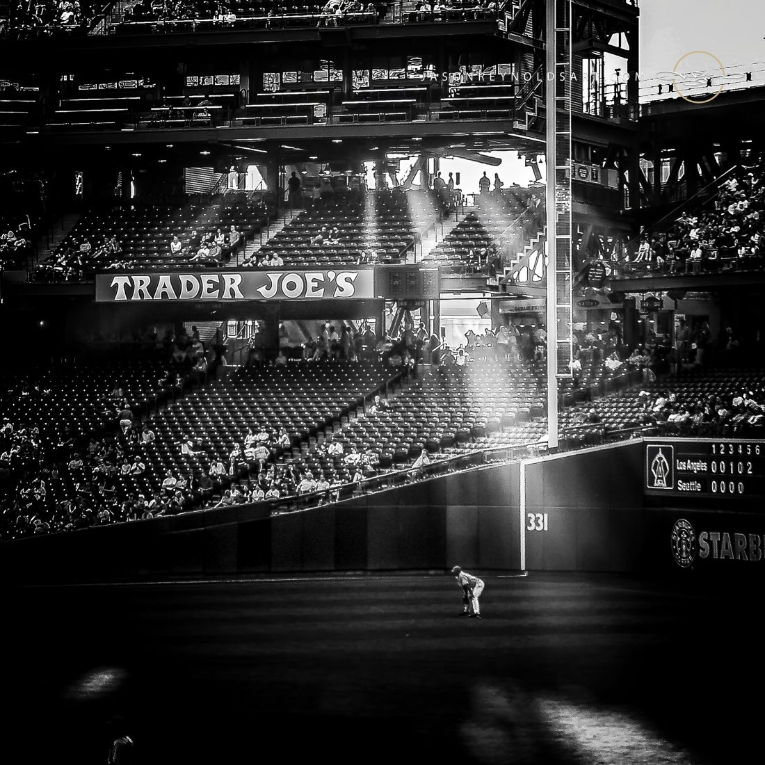 Seattle outfielder bathed in stadium light