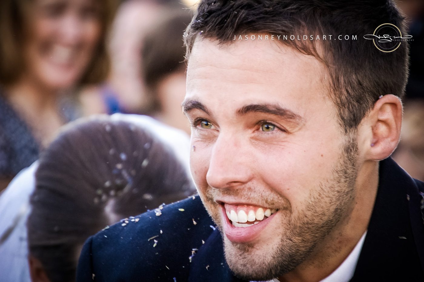 Smiling Man with Confetti — Close-Up