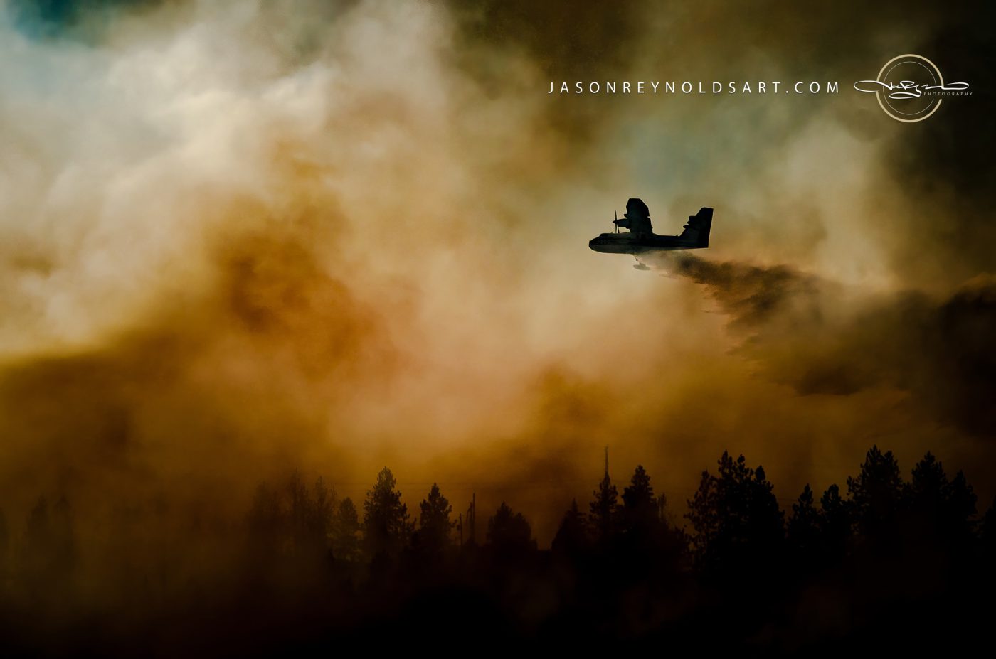 Spokane Valley air tanker over Millwood forest