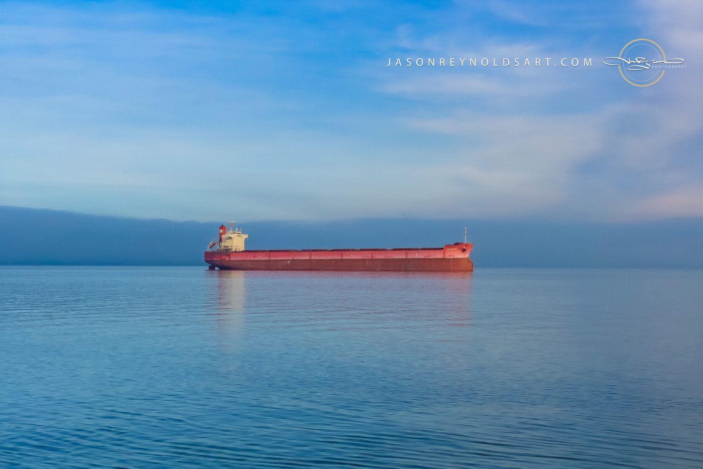 Tacoma — Red Bulk Carrier on Glassy Puget Sound