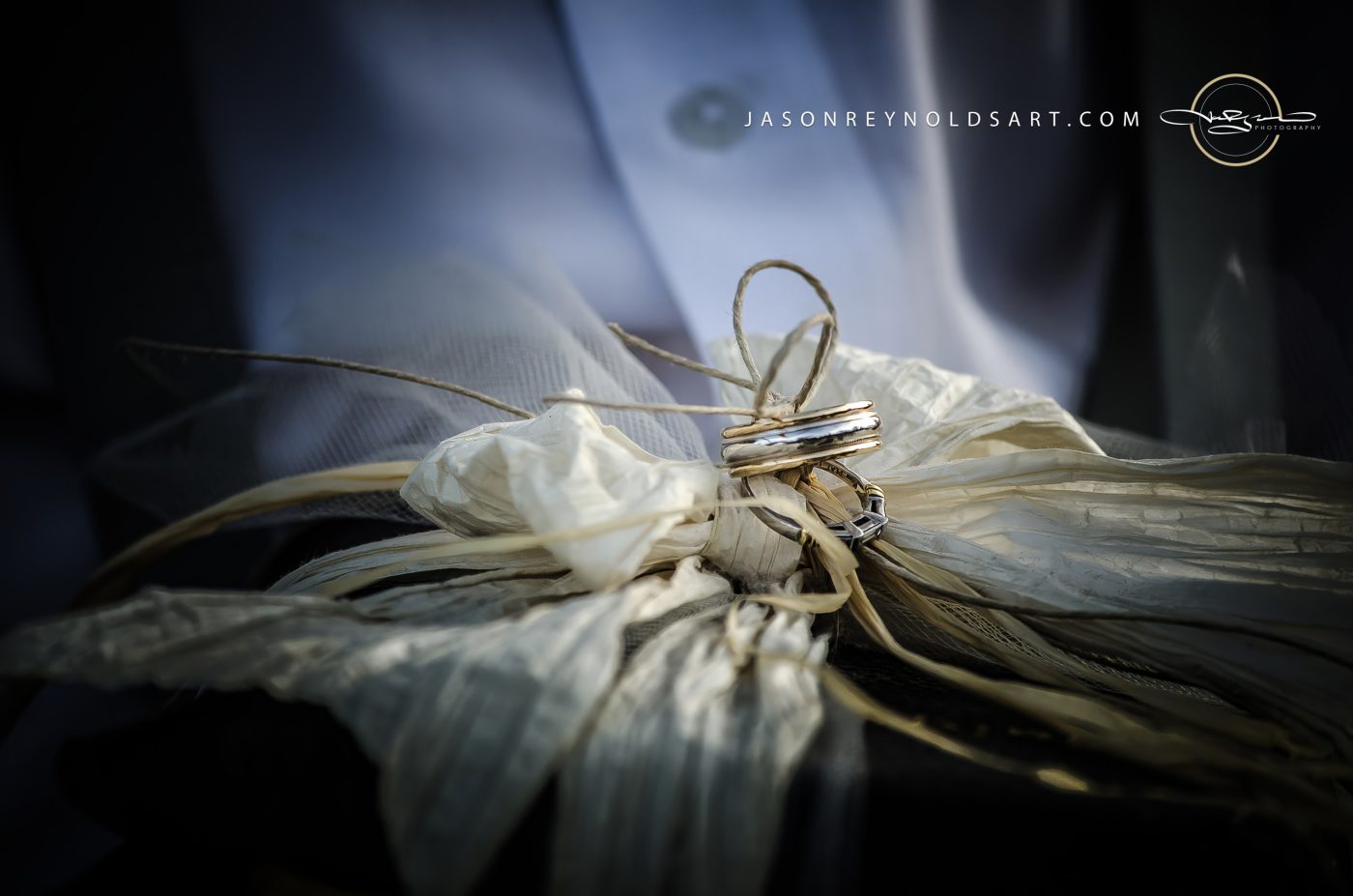 Tied Wedding Bands on Raffia Ring Pillow