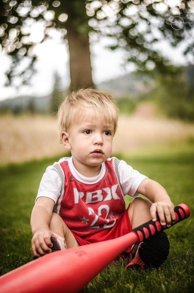 Toddler in Red Jersey with Baseball Bat